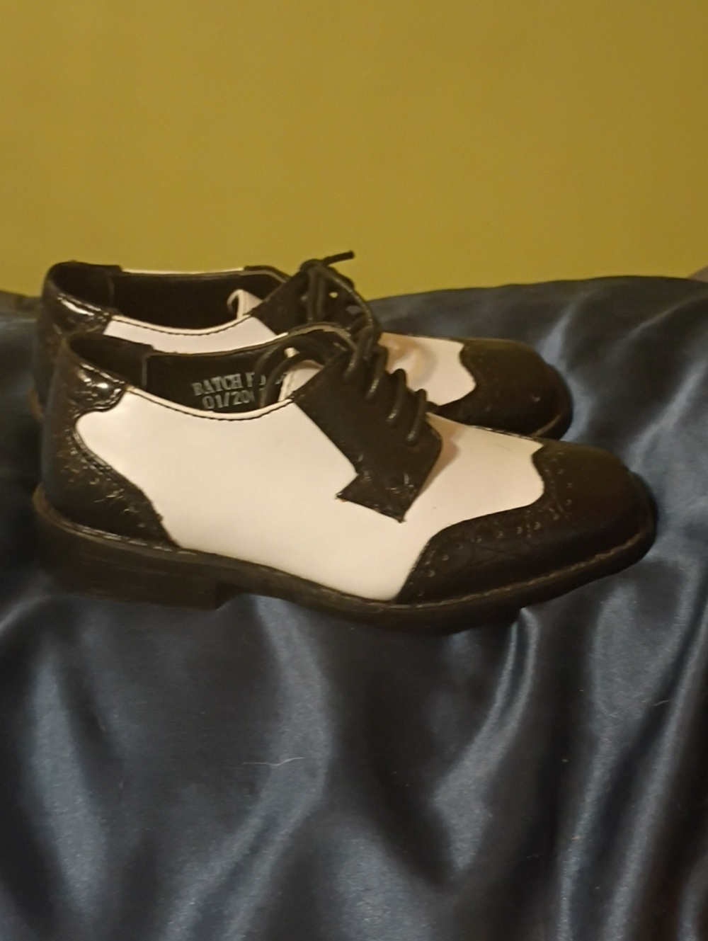 Classic Black and White Men’s Wingtip Oxfords